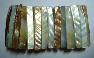 THE SCIENCE BEHIND THE IRIDESCENT GLOW OF MOTHER OF PEARL